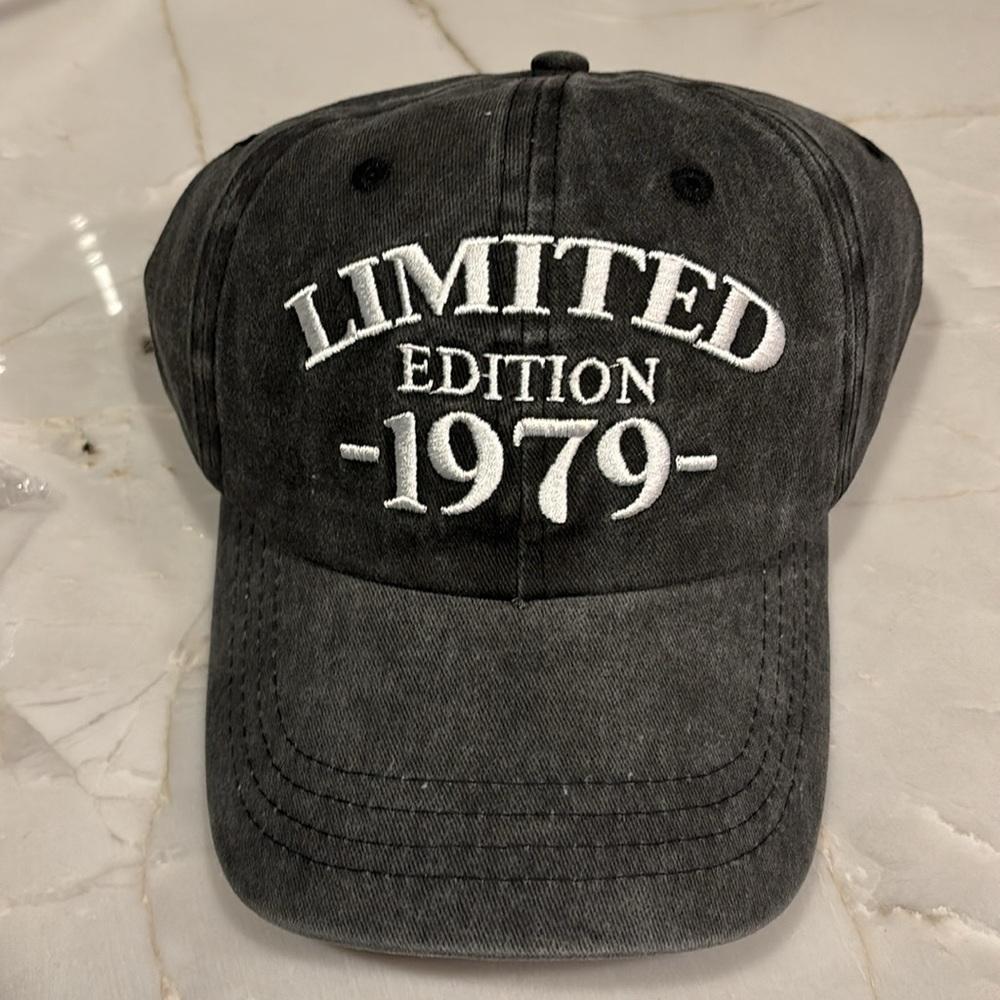 Brand new in package. Limited edition 1979 adjustable hat.